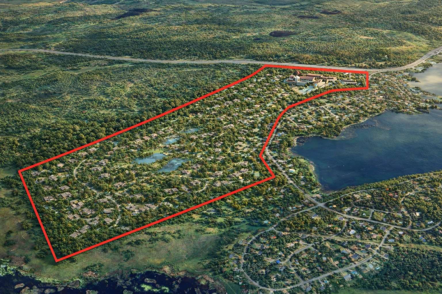 Aerial view of the 370-acre parcel outlined beside the lake and 108 Golf Resort